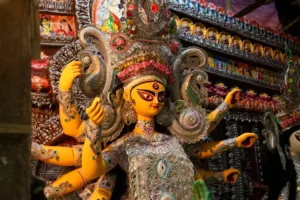 Sindoor Khela ritual with married women offering vermilion to Goddess Durga on Vijaya Dashami