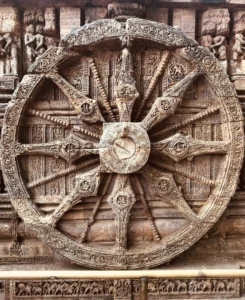 Intricate stone wheel carving at the Sun Temple, showcasing the temple’s unique architectural features