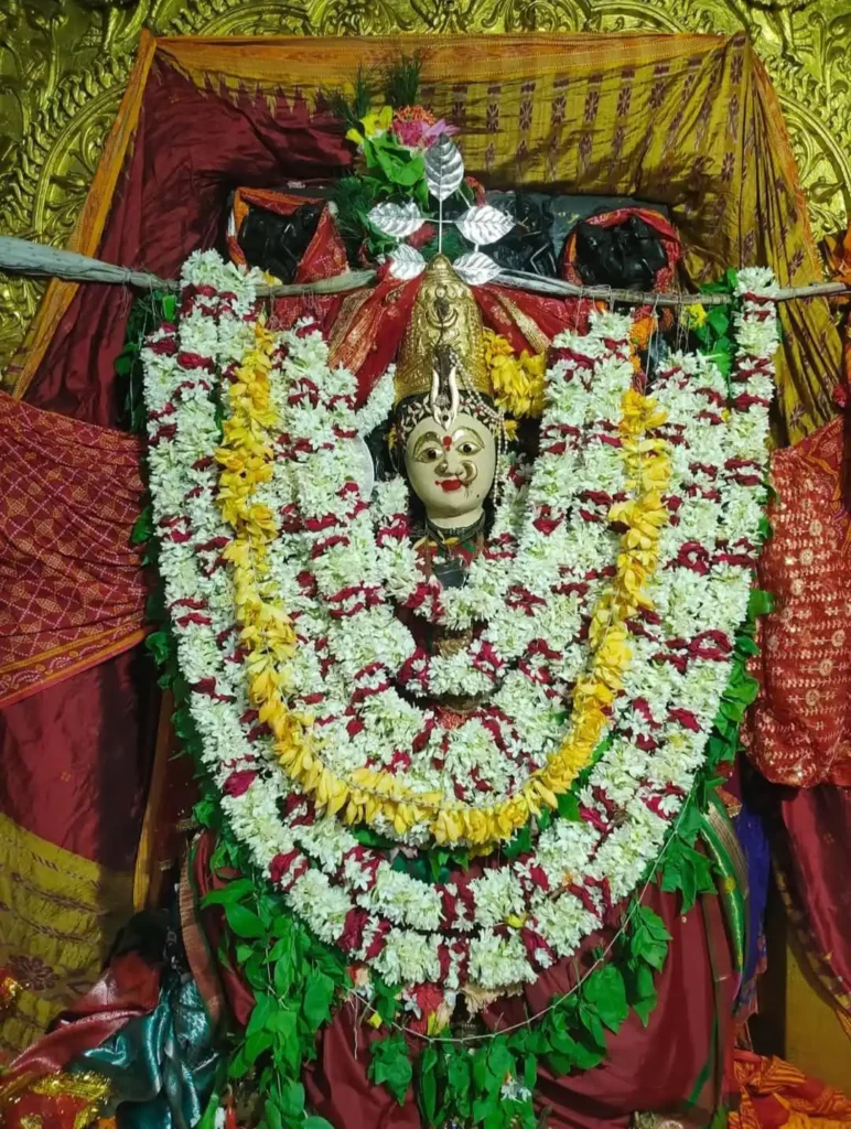 Maa Mangala idol adorned with floral garlands at Kakatpur Temple